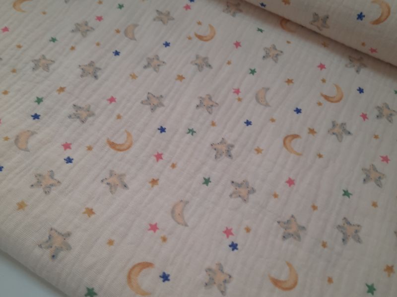 Tela MUSELINA FONDO BEUS LUNAS Y ESTRELLAS 