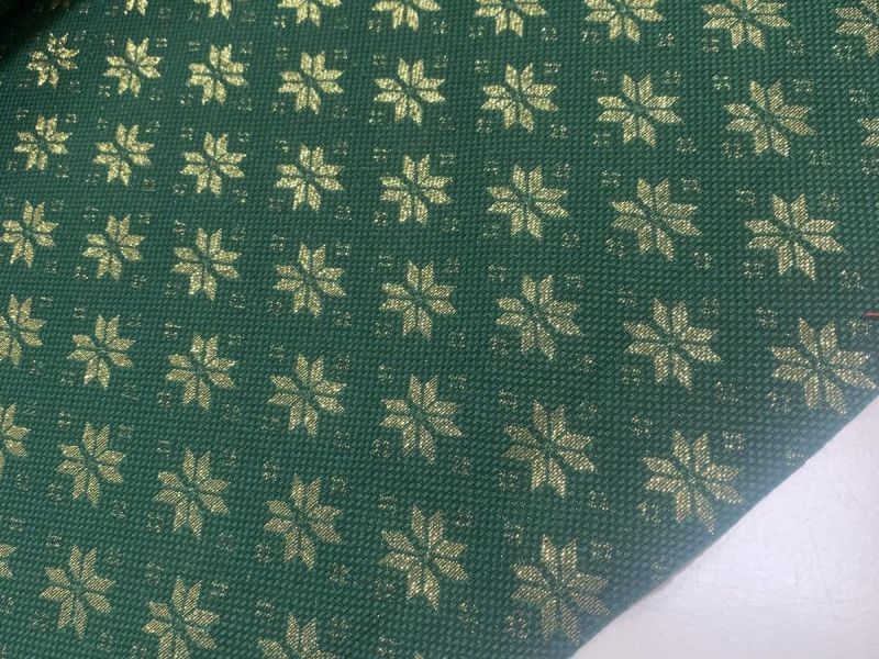TELA BROCADA NAVIDAD VERDE ESTRELLA DORADA 
