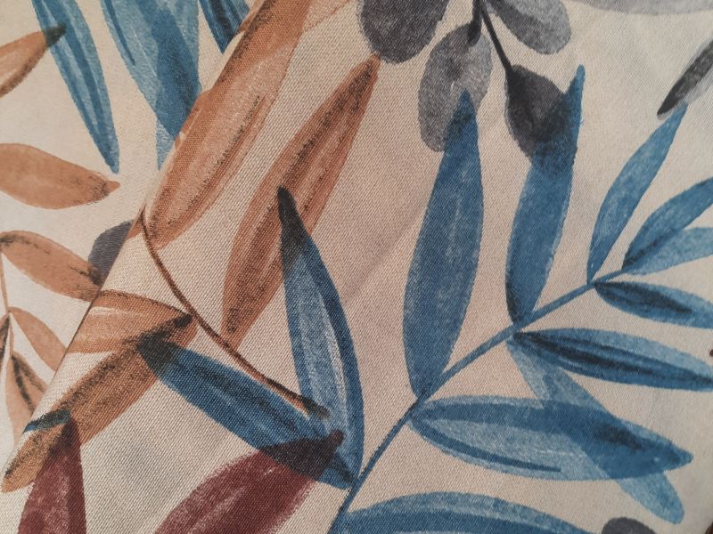 Loneta ESTAMPADA HOJAS CAMEL Y TURQUESAS 